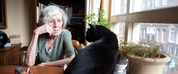 Elderly lady with her cat