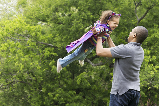Father and daughter playfully